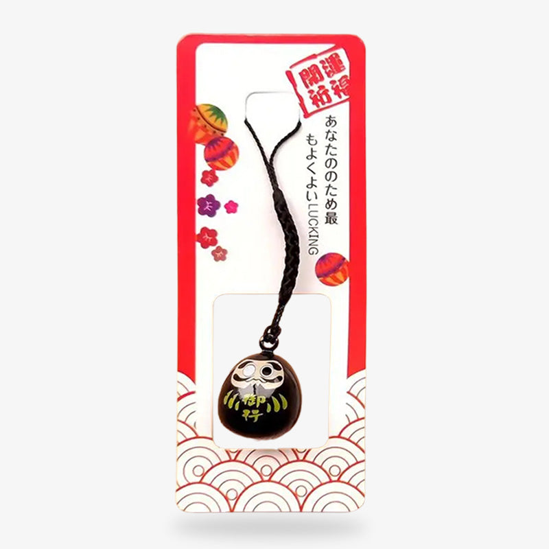 Llavero Daruma negro que representa protección según la tradición japonesa