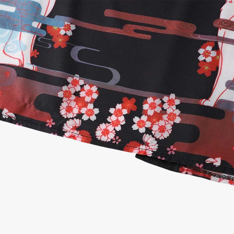 Kimono kitsune negro estampado con flores de sakura blancas