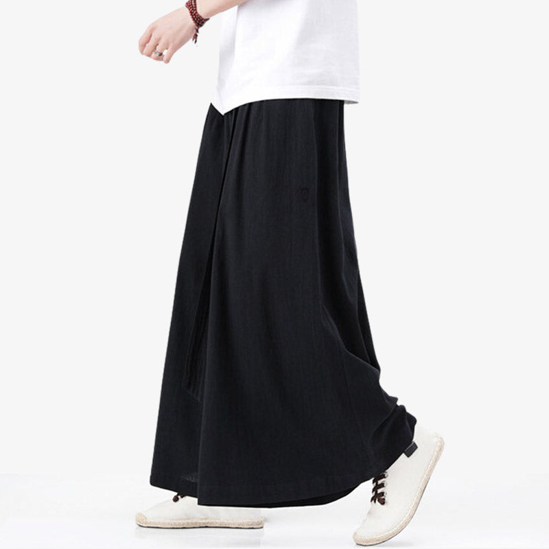 Estos pantalones negros tradicionales japoneses de corte ancho son unos pantalones hakama samurai