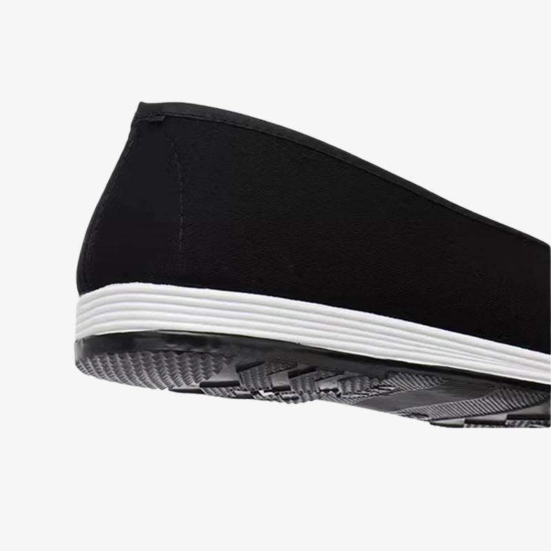 Zapatillas negras de inspiración manga con suela antideslizante para caminar con seguridad