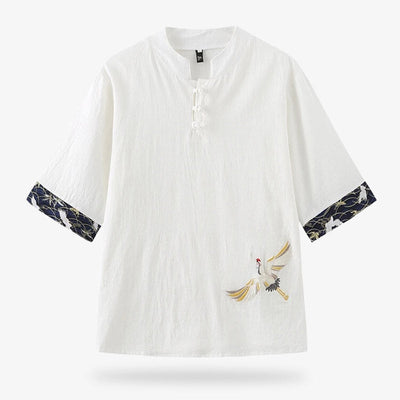 Camiseta japonesa bordada con motivo de grulla tsuru sobre tela blanca de algodón y lino