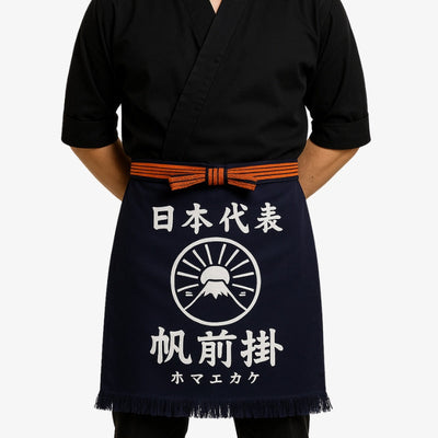 Delantal de cocina tradicional en algodón azul marino con kanji blanco, reflejo del diseño japonés y la artesanía de calidad