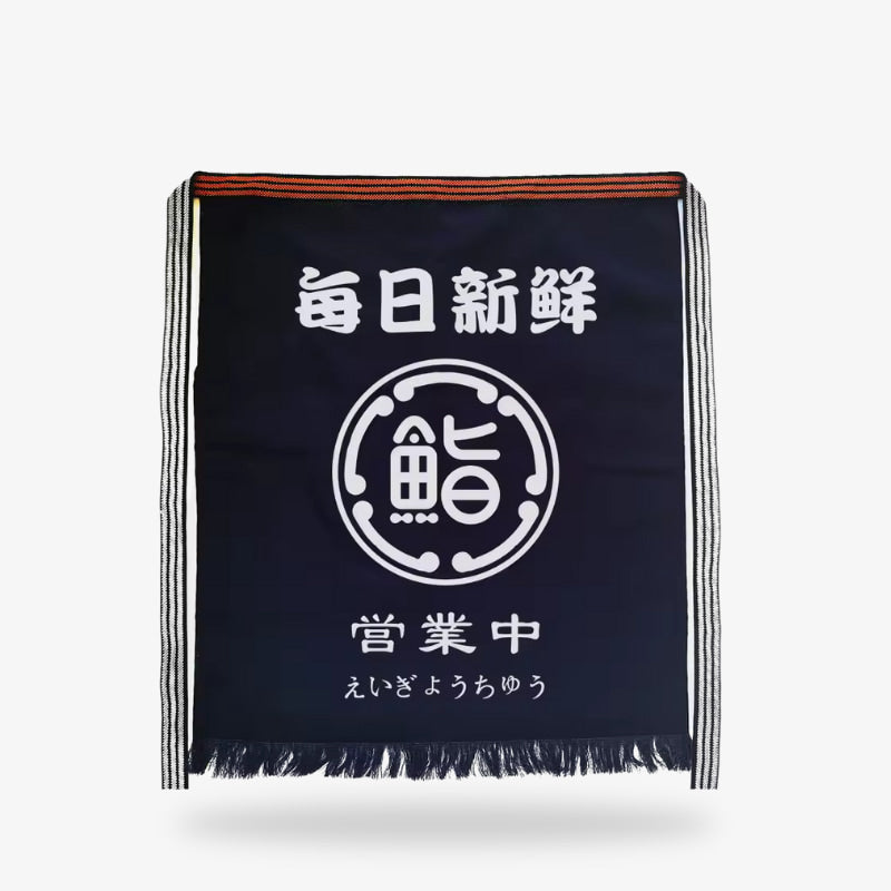 Delantal japonés para hombre confeccionado en algodón premium azul marino con kanji blanco, pensado para la cocina tradicional japonesa