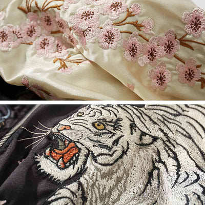 El motivo de tigre sukajan es un diseño audaz que simboliza fuerza y poder en la cultura japonesa, junto a flores de sakura bordadas