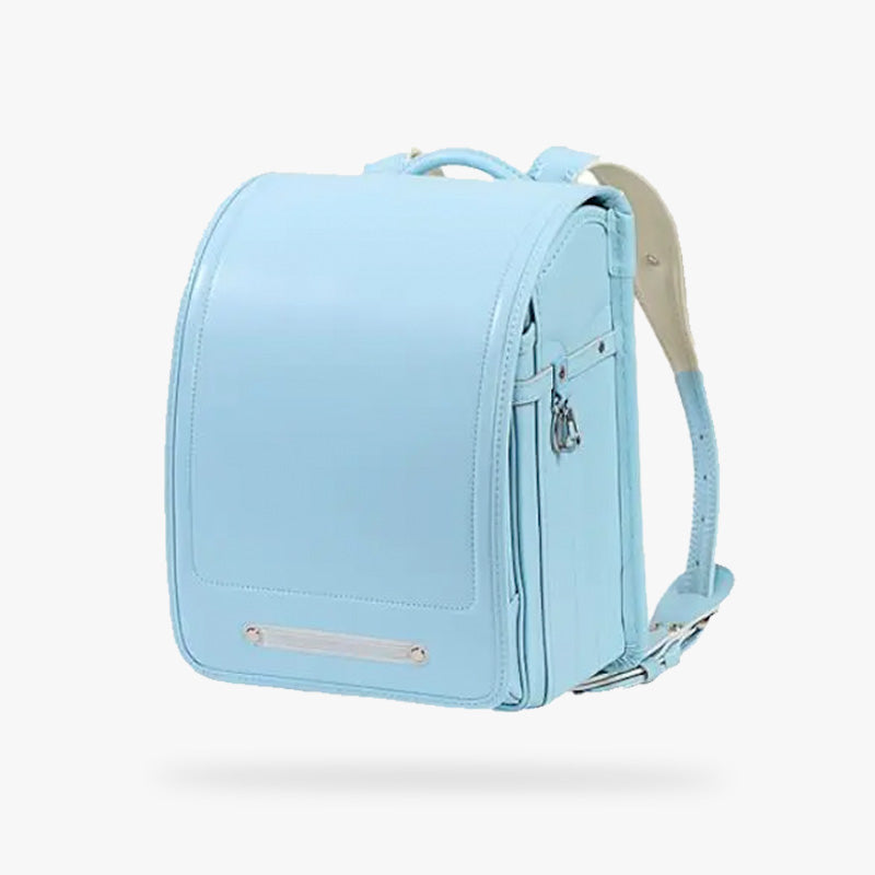 Mochila randoseru japonesa de piel en color azul con tirantes acolchados