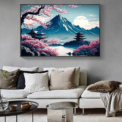 Decoración de pared con paisaje cultural japonés: cuadro del Monte Fuji colgado en un salón con sofá y mesa de centro
