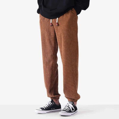 Pantalones japoneses de pana con diseño retro y tejido texturizado, mezcla de artesanía tradicional y streetwear moderno