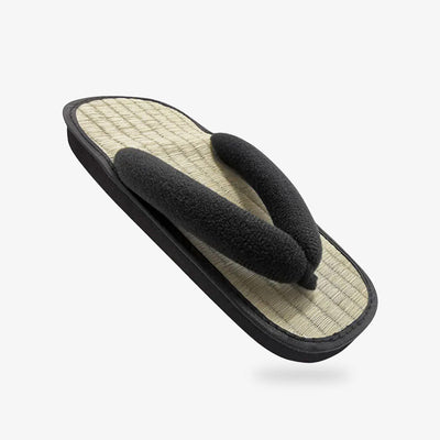 Surtido de sandalias geta japonesas con tira negra y suela de paja