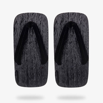 Sandalias japonesas negras de líneas sobrias, versátiles para ocasiones formales y informales