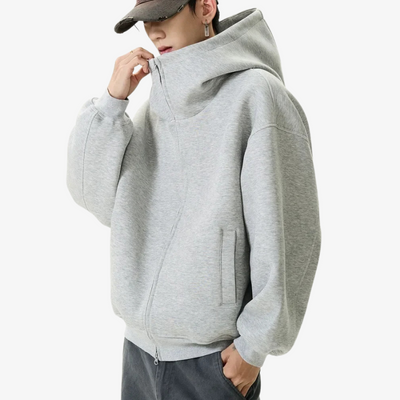 Hombre con sudadera Harajuku de corte oversize inspirada en la escena urbana de Tokio