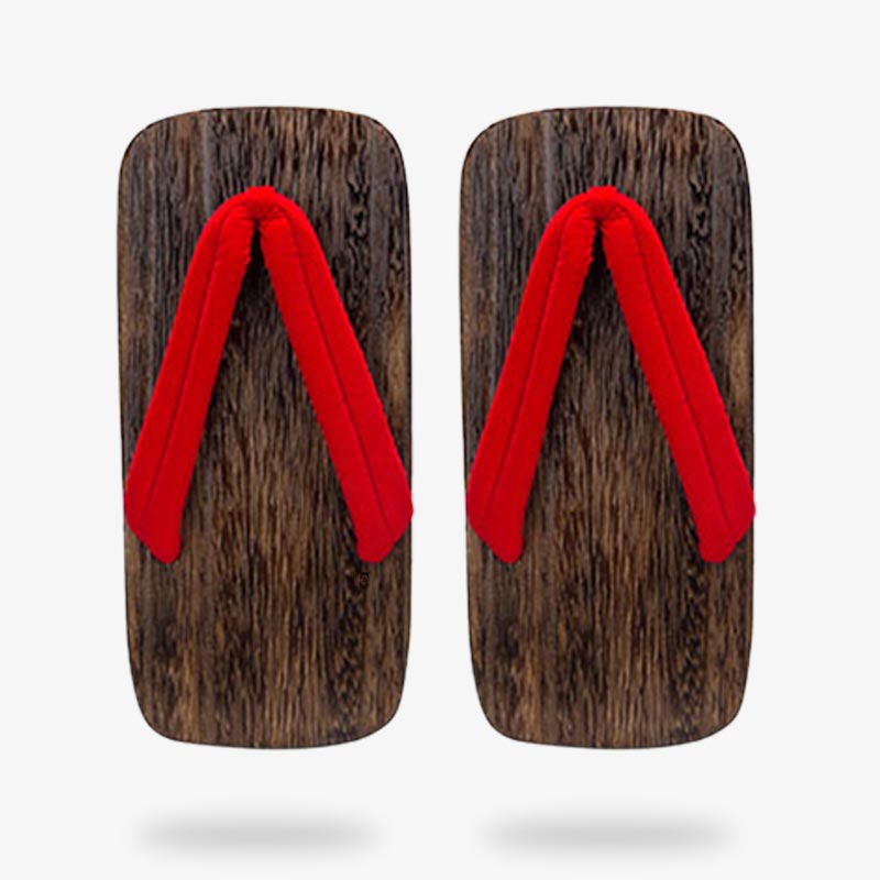 Dos sandalias de estilo japonés hechas a mano con correas rojas